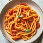 Pici all’Aglione (Pici Pasta with Garlic Tomato Sauce)