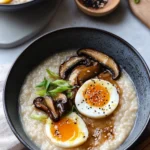 Miso Congee with Tamari marinated Shiitake Mushroom, Jammy Egg and Spicy Sesame Spring Onions