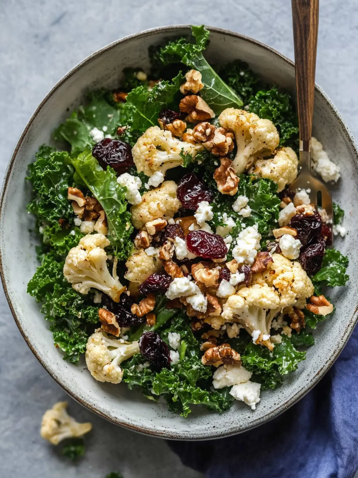 Roasted Cauliflower Kale Salad with Dried Cherries, Walnuts, and Feta