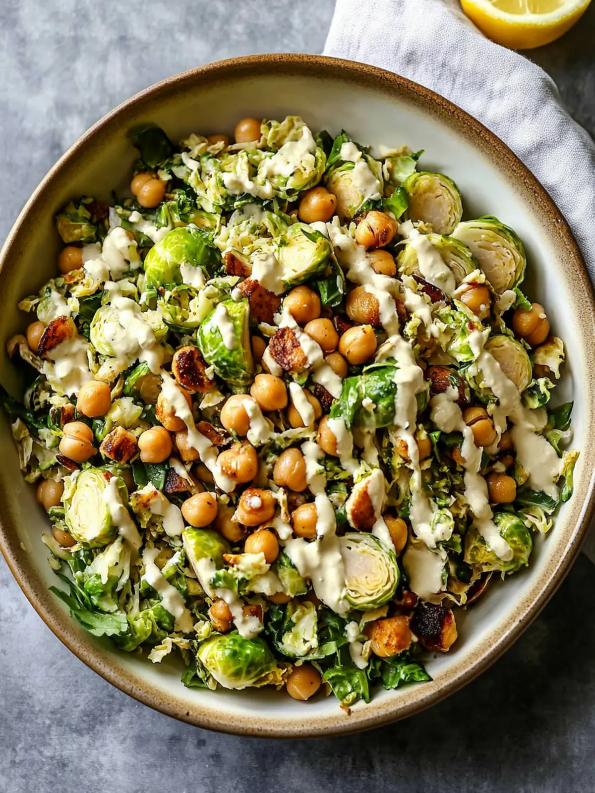Shaved Brussels Sprouts Salad with Chickpeas and Lemon Tahini