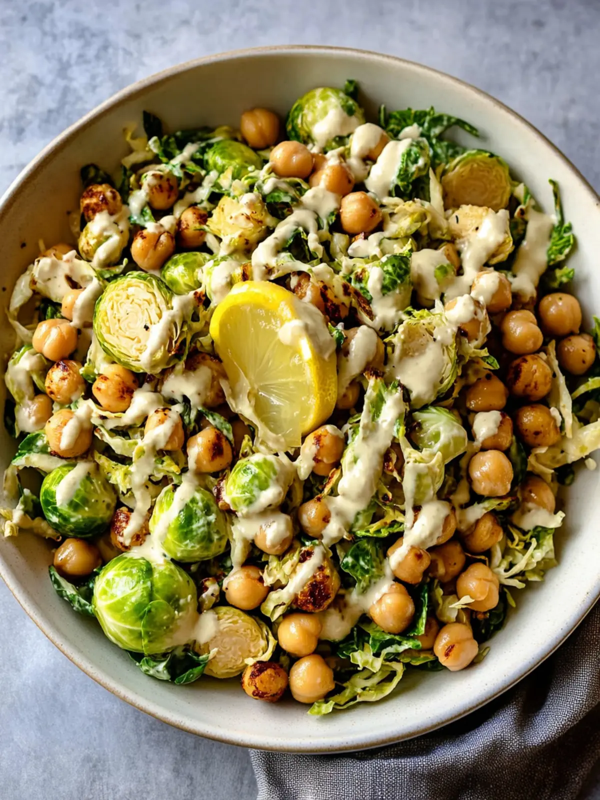 Shaved Brussels Sprouts Salad with Chickpeas and Lemon Tahini